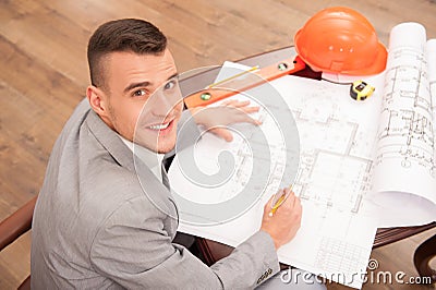 Young handsome architect engineer working on Stock Photo