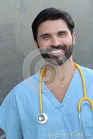 Young handsome bearded doctor smiling Stock Photo