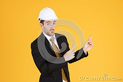 Young handsome businessman wears suit and construction helmet Stock Photo