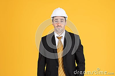 Young handsome businessman wears suit and construction helmet Stock Photo