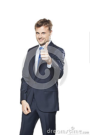 Young handsome businessmen showing thumb-up Stock Photo