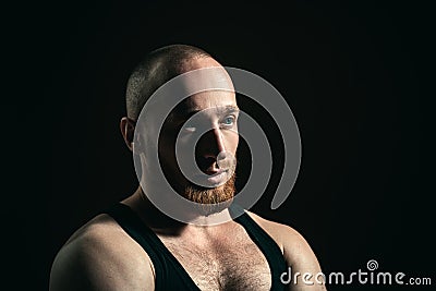 Young handsome man with red beard, mustache and trendy hairdo. Stock Photo