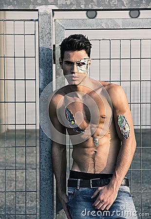 Young Handsome Shirtless Robotic Man in the Street Stock Photo