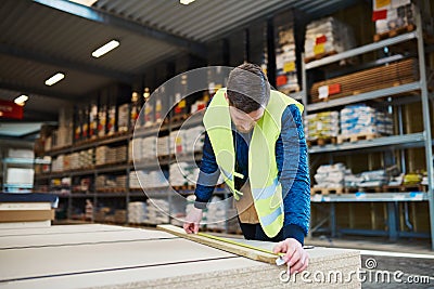 Young handyman working in a warehouse Stock Photo