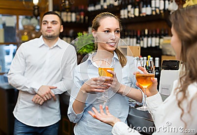 Young happy adults at bar Stock Photo