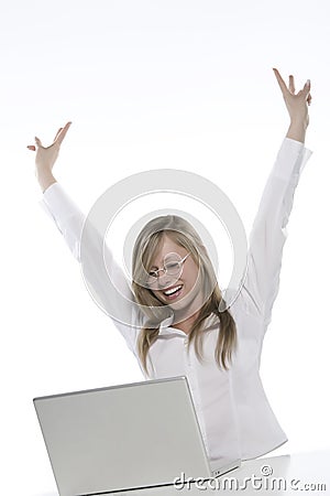 Young happy blonde woman at the computer Stock Photo