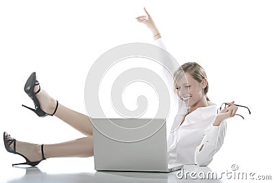 Young happy blonde woman at the computer Stock Photo