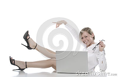 Young happy blonde woman at the computer Stock Photo