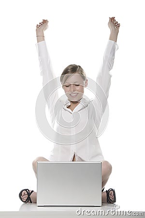 Young happy blonde woman at the computer Stock Photo