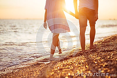 Young happy couple on seashore. Stock Photo