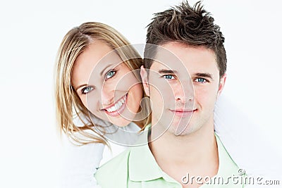 Young happy couple standing over white background Stock Photo