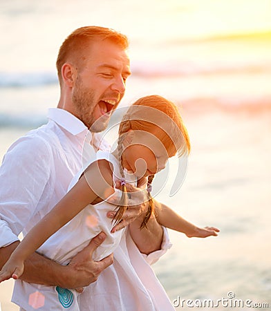 Young Happy Father having fun with his Little Daughter Stock Photo