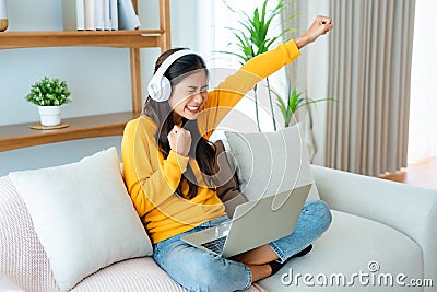 Young happy lucky woman student feeling excited winning Stock Photo