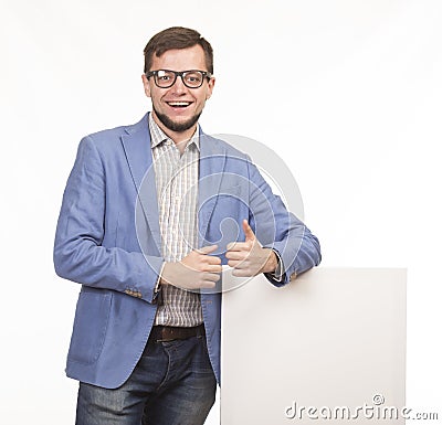 Young happy man showing presentation, pointing on placard Stock Photo