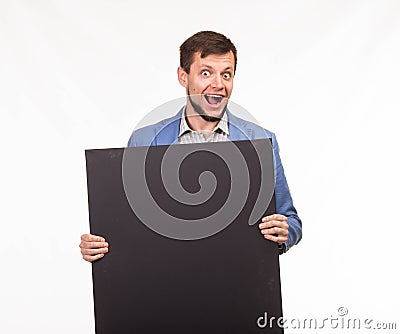 Young happy man showing presentation, pointing on placard Stock Photo