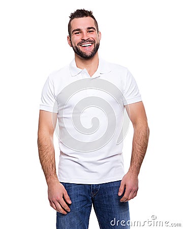Young happy man in a white polo shirt Stock Photo