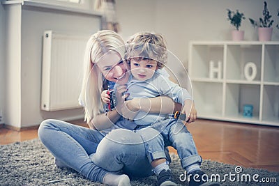 Young happy mother have play with her son. Stock Photo