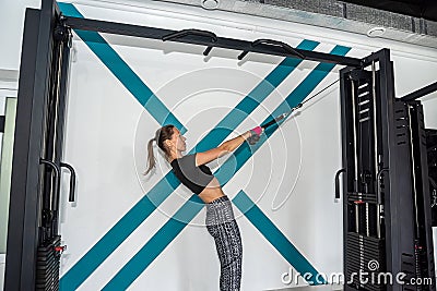 Young happy strong skinny sports athlete woman in fitted sportswear warm up training. Stock Photo
