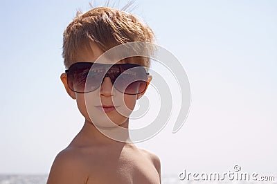 Young happy trendy with sun glasses Stock Photo