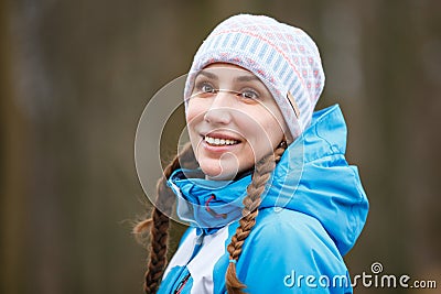 Young happy woman with braids on winter activity Stock Photo