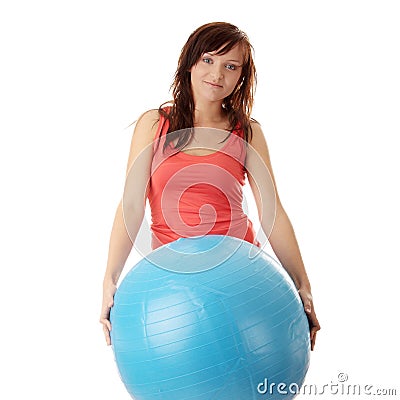 Young happy woman doing fitness exercise Stock Photo