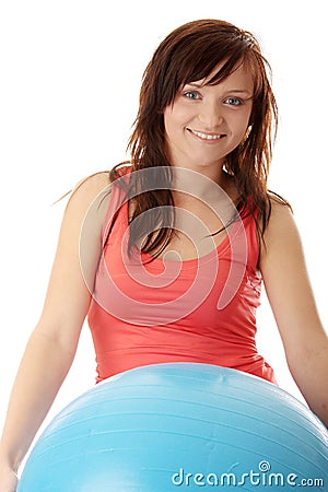 Young happy woman doing fitness exercise Stock Photo