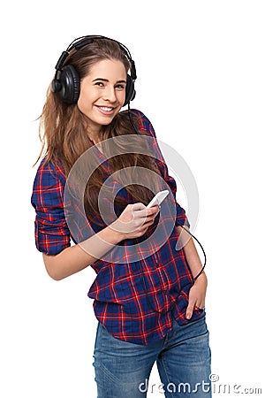 Young happy woman listen to music isolated on white. Stock Photo