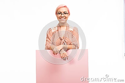 Young happy woman showing presentation, pointing on placard Stock Photo