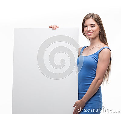 Young happy woman showing presentation, pointing on placard Stock Photo