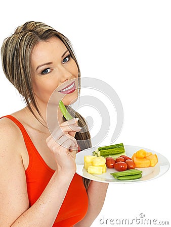 Young Healthy Attractive Woman Eating Five A Day Fruit and Vegetables Stock Photo