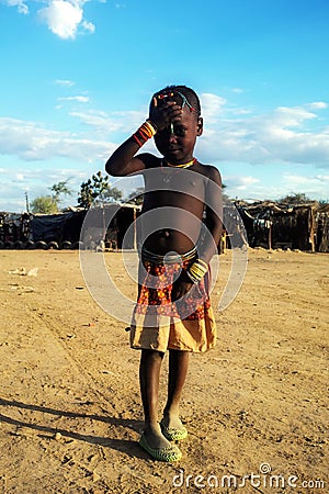 Young Himba girl at the market in Opuwo, Namibia Editorial Stock Photo