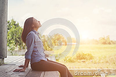 Young hipster woman lounging, relaxing atmosphere in the morning Stock Photo