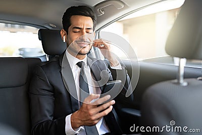Businessman Listening Music In Car Stock Photo
