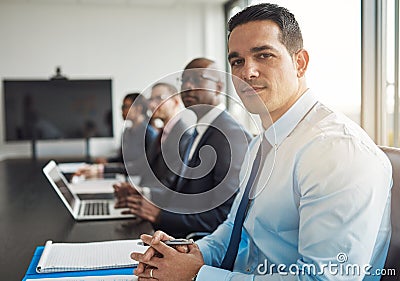 Young Hispanic businessman in a meeting Stock Photo