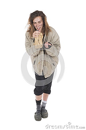 Young homeless alcoholic who laughs for the euphoria Stock Photo