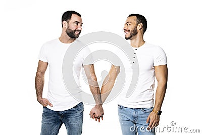 Young homosexuals gay couple love each other on a white background. Stock Photo