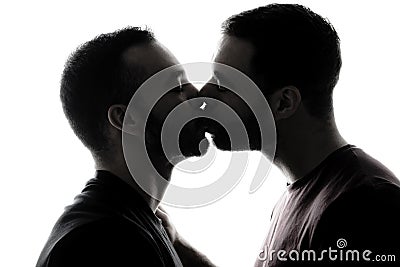Young homosexuals shadow couple love each other on a white background. Stock Photo