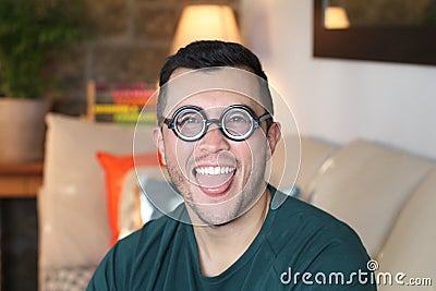 Young humorous man with old fashioned eyeglasses Stock Photo