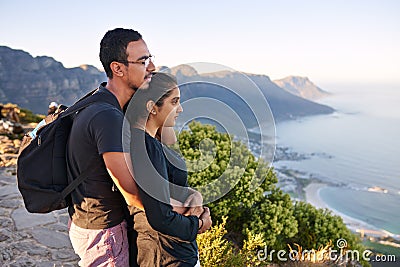 Young Indian couple on a nature hike enjoying the view Stock Photo