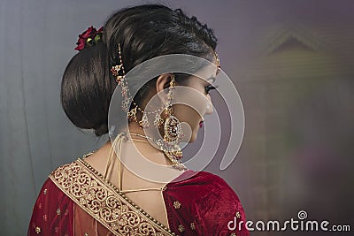 Young Indian woman in bridal wear Stock Photo