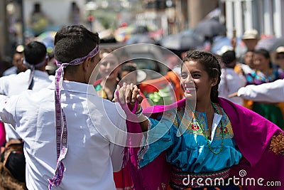 Young indigenous dancers in traditional wear in Ecuador Editorial Stock Photo