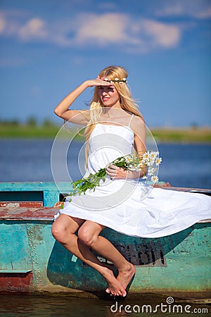 A young innocent girl at the lake Stock Photo