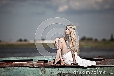 A young innocent girl at the lake Stock Photo