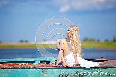 A young innocent girl at the lake Stock Photo