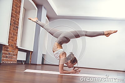 Young instructor in yoga class Stock Photo