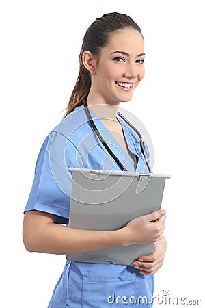 Young intern nurse posing holding a medical history Stock Photo