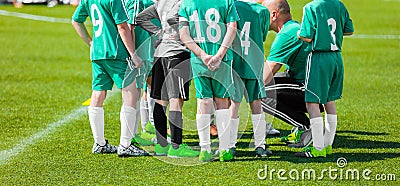 Young Kids with Chaoch on a Soccer Team Editorial Stock Photo