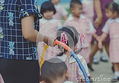 Young Kids exercise with hoola hoop Editorial Stock Photo