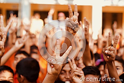 Young kids showing victory sign unique photo Editorial Stock Photo
