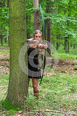 Young lady Elf with a long bow Stock Photo